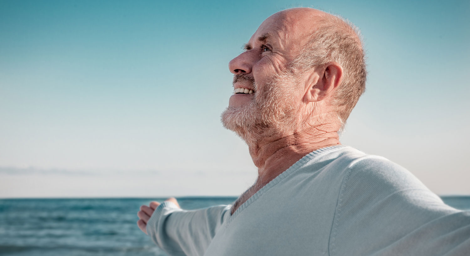 AdobeStock_115286144 / detailblick-foto ein Mann am Meer